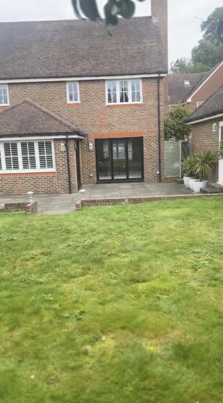 Original Dell garden — rear elevation with small terrace and lawn